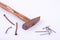 old Tack hammer and rust nail tack used on white background tool isolated