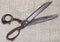 Old tailor shears on textile