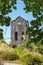 Old tall industrial building at Waihi gold mine, New Zealand