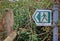 Old and tatty public footpath sign