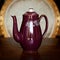 Old teapot in ukrainian style in luxury interior.