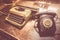 Old telephone and type writer on desk
