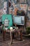 Old television, radio and wooden table with samovar