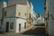 Old terraced houses with cracked plaster