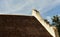 An old thatched roofed building with original Cape Dutch gable