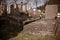 Old tilted and damaged graves