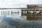 Old timber wharf and shed on lagoon