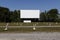 Old Time Drive-In Movie Theater with blank white screen for copy space or advertising