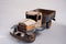 old tin cargo truck tin toy from the year 1950 faded profile