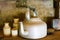 Old tin kettle and earthenware pots and jugs