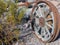 Old tires with metal Wagon wheel spikes in the desert in Arizona in a deserted ghost mining town.