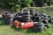 Old tires and rusty metal barrels at the landfill