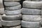 Old tires stacked in a pile, close-up photo