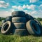 Old tires stacked in a pile, recycling concept, environmental issue