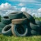 Old tires stacked in a pile, recycling concept, environmental issue