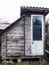 An old toilet wooden outhouse privy in the garden