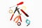 Old tools screwdriver, nippers, tape measure, electrical tape for repair and installation