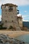 Old tower at the beach in Ouranoupoli, Athos peninsula, Chalkidiki, Greece