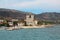 Old tower at the beach in Ouranoupoli, Athos peninsula, Chalkidiki, Greece