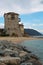 Old tower at the beach in Ouranoupoli, Athos peninsula, Chalkidiki, Greece