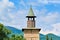 Old tower in the center of Berkovitsa town, Bulgaria. Built in 1762, stones are cemented with mortar