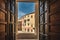 Old town Alghero seen through a beautiful door