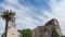 The Old Town of Budva, Montenegro - an old stone church adhering to the fortress of Budva to the Adriatic Sea. Flowers and palms