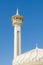 Old town dubai white mosque against a beautiful bright blue sky