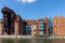 Old town of Gdansk with the medieval port crane  and a promenade along the riverbank of Motlawa River