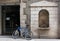 Old town of Girona. Ancient fountain and modern bycicle