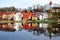 Old town houses with lake reflection