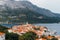 Old town of Korcula on the background of the mountains of Peljesac peninsula, Adriatic sea, Croatia