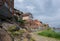 Old town of Lauenburg, coastal promenade and historic brick houses on the dike wall made of field stones on the river Elbe in