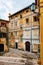 Old town of Lovran in Croatia, distinctive Istrian architecture with worn facades and wooden window shutters