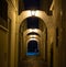 Old town of Menton in France by night -arcades with lamps