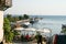 Old Town of Nesebar. View of the pier from the restaurant, high-speed boat, tugs in the port of