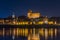 Old town of Torun with Church of St. John the Baptist and St. John the Evangelist. View on vistula river at night