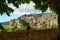 Old town of Valldemossa through a natural frame of trees