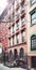 Old townhouses in Manhattan, color toning applied, New York, USA