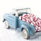 Old toy truck carrying peppermint candy
