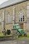 Old tractor and church, ardennes