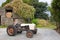 Old tractor in farmyard