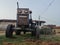 Old tractor in an Indian Village. Resting below the open sky