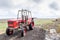 Old tractor parked on a hill in the desolate lands