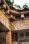 Old traditional arabian style decoration wooden column corner on an ancient landmark in Marrakesh