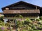 Old traditional architecture and farmhouse on the slopes of Vitznauerstock peak