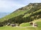 Old traditional architecture and farmhouse on the slopes of Vitznauerstock peak