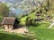 Old traditional architecture and farmhouse on the slopes of Vitznauerstock peak