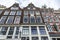 Old traditional leaning houses in Amsterdam, Netherlands