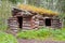 Old traditional log cabin rotting in Yukon taiga